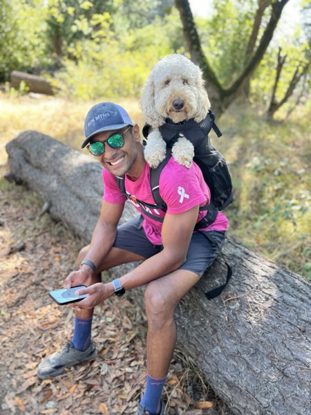 Allen hiking with his dog